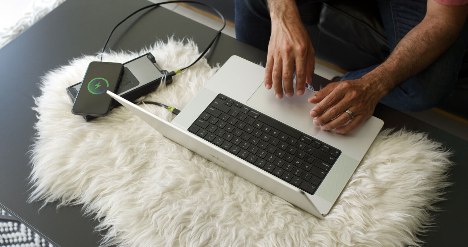 Laptop plugged into a Goal Zero power bank